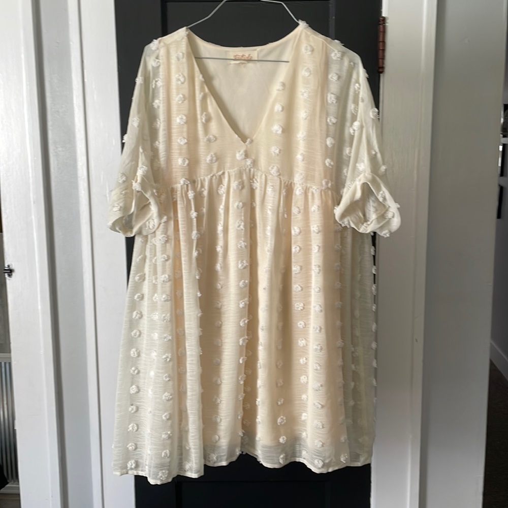 Boutique cream mini dress
